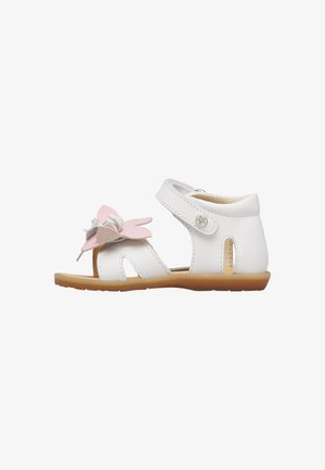 Sandale blanche pour tout-petit avec décoration papillon rose et beige, bride de cheville avec bouton étoile et semelle beige.