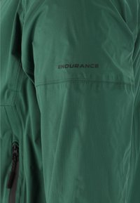 Endurance KOMINT - Veste de running - groen