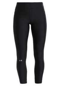Černé legíny vyrobené z elastického materiálu s vysokým pasem a těsným střihem. Obsahují malé logo na dolní části levé nohy.