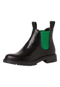 Bottes Chelsea en cuir noir avec panneaux élastiques verts sur les côtés, semelle en caoutchouc et languettes pour tirer. Caractérisées par un bout arrondi et une semelle crantée épaisse.