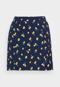 Blå kjol med gult citronsmönster och gröna blad. Tillverkad av mjukt tyg, med rak passform och en slitsdetalj på sidan.