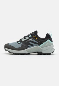 Unselected, semi flash aqua/core black/beige