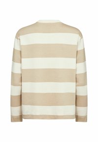 Lange mouwen shirt in beige en witte strepen. Zacht katoenen materiaal, ronde hals en een comfortabele pasvorm. Geribbelde manchetten en zoom.