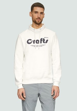 Witte hoodie met een hoge kraag, voorzien van een donker grafisch print op de borst en trekkoordaccenten. Zachte textuur, ribgebreide manchetten.