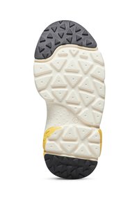 La suola delle sneakers presenta una base in gomma bianca testurizzata con accenti gialli e un tallone nero. Il notevole motivo a triangolo del battistrada migliora la presa.