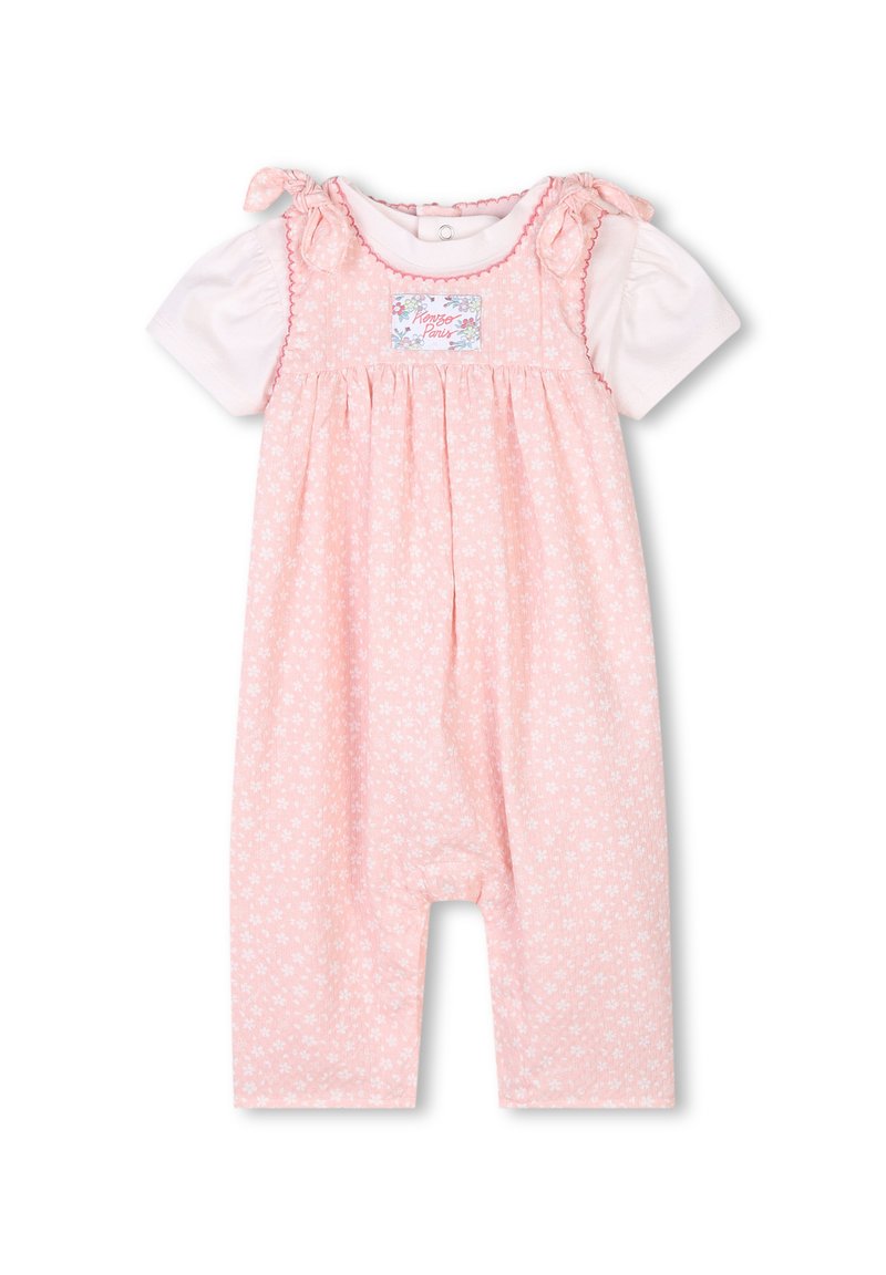 Romper con stampa floreale rosa e maniche corte bianche. Presenta dettagli con nastri sulle spalle e un'etichetta con il design "Romper Pants".