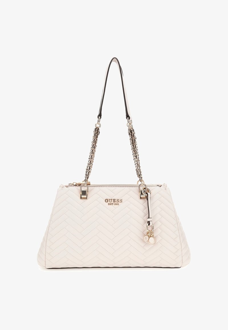 Quilted cream handbag with a structured shape, silver chain and leather straps, gold logo detail, and a charm with a letter accent.