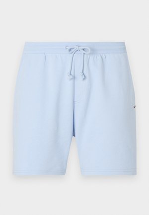 Pantalones cortos de algodón azul claro con cinturilla elástica, cordón y bolsillos laterales. Presenta un pequeño logo en la parte inferior de la pierna izquierda.