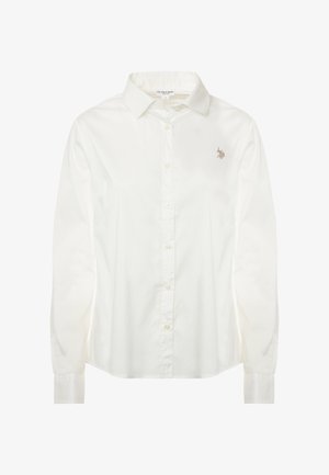 Camicia bianca a maniche lunghe con bottoni, realizzata in cotone, caratterizzata da un colletto classico e un piccolo logo ricamato di colore contrastante sul lato sinistro del petto.