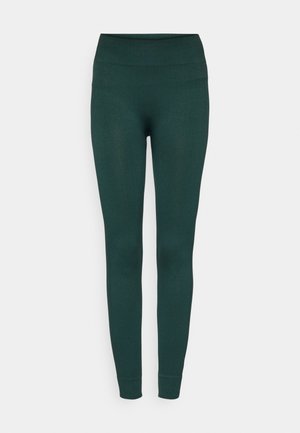 Leggings de canalé verde oscuro con una alta cinturilla, piernas ajustadas y una textura suave, diseñadas para la comodidad y la flexibilidad en el movimiento.
