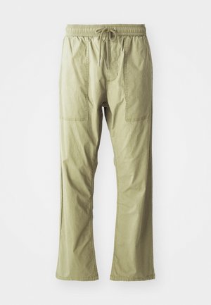Olive green, lightweight cargo pants with a drawstring waist, two front pockets, and a relaxed fit. Smooth cotton fabric, straight leg design.