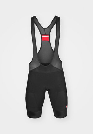 Cuissard de cyclisme noir avec bretelles en mesh, rembourrage au niveau de l'assise et ourlets élastiques aux jambes. Présente un petit logo rouge de la marque près de l'ourlet.