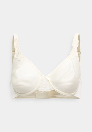Cream-colored bra with lace accents on the straps and center. Features molded cups, smooth fabric, and a secure hook closure at the back.