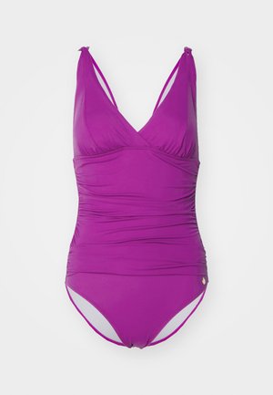Purple one-piece swimsuit with ruched detailing, plunging neckline, and thin straps. Features ivory accents at the legs and a gold logo badge.
