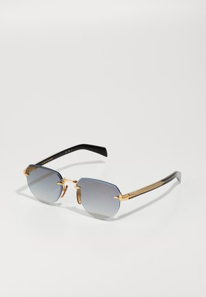 Ochelari de soare pătrați cu lentile gri degradé, accente din metal aurit și brațe texturate negre. Prezintă un design elegant și pernuțe de nas ajustabile.