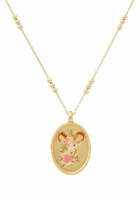 Gold chain necklace with oval pendant featuring a ram's head and pink floral design on a textured background.