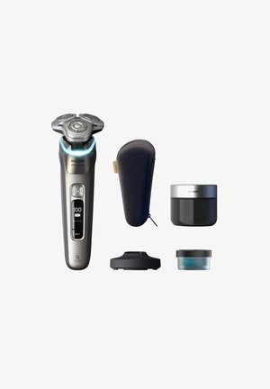 Philips electric shaver with three rotary heads, silver and black body, LED display, includes a case, cream jar, and cleaning container.