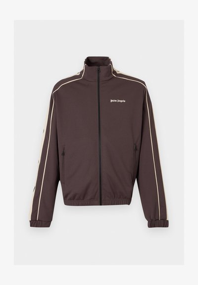 Σκούρο καφέ αθλητική ζακέτα με φερμουάρ, με μπεζ ρίγες στα μανίκια και το λογότυπο "Palm Angels" στο αριστερό στήθος.