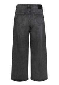 Szerokie czarne dżinsy o gładkiej fakturze, z dwiema tylnymi kieszeniami i naszywką z logo na pasku.