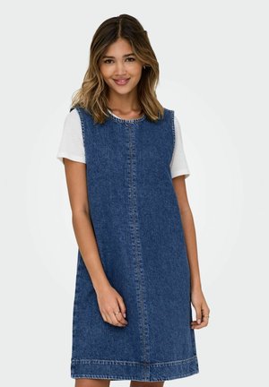 Denim A-line haljina u plavoj boji, s okruglim izrezom, bez rukava i suptilnim detaljima šivanja. Ležeran, do koljena.