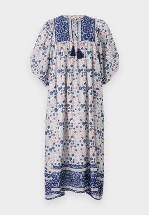 Lillelille lillelille, millelille on ringikujuline krae, puhv-vari ja tumesinised aksendid. Omab tekstuuriga kangast, millel on sinised ja roosad lillemustrid.