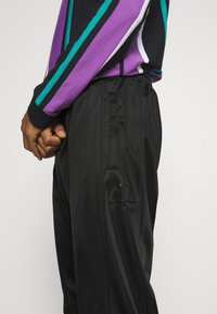 Ellesse Träningsbyxor - black