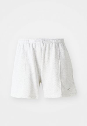 Gray athletic shorts made of lightweight fabric, featuring an elastic waistband, stitched accents, and a small logo on the bottom left side.