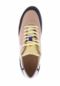 Beige and navy sneaker with synthetic and suede materials, round toe, yellow laces, and logo detail on the tongue. Textured accents present.