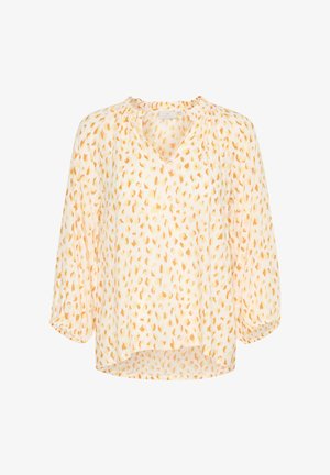 Könnyű, áttetsző blúz világos sárgában, szétszórt narancs és rózsaszín levélformájú mintákkal, V-kivágással és háromnegyedes ujjal.