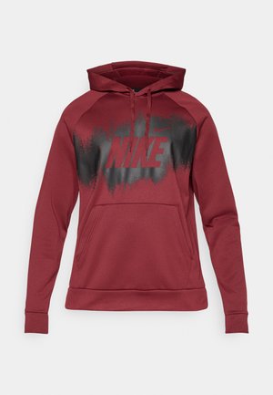 Bordo Nike dukserica s crnim efektom spreja preko prsa, koja sadrži Nike logo i prednji džep u obliku kengura.