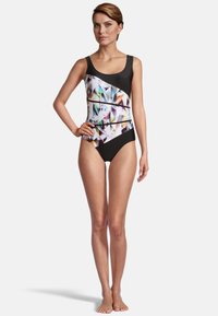 Maillot de bain une pièce noir avec un motif géométrique coloré sur le devant, présentant une encolure dégagée et une coupe ajustée. Texture lisse, sans manches.
