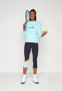 Endless LINE POCKET - Háromnegyedes sportnadrágok - black aqua