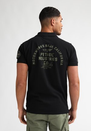 SUSPENSIÓN - Poloshirt - black