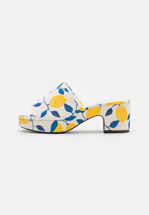 Monki Muiltjes met hak - light yellow