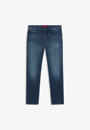 Jean en denim bleu foncé avec une coupe slim, design cinq poches, fermeture par bouton et légère décoloration sur l'avant des cuisses.