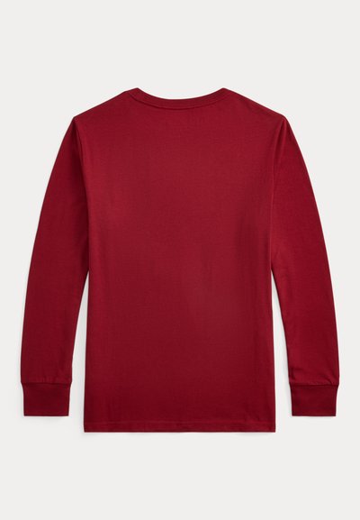 Hosszú ujjú póló mélyvörös pamutszövetből, kerek nyakkivágással és varrott részletekkel az ujjak végén és az alján.