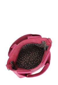 Roze stoffen handtas met dubbele handgrepen, ritssluiting en een gevoerd interieur met een donker basis en lichte stippen.