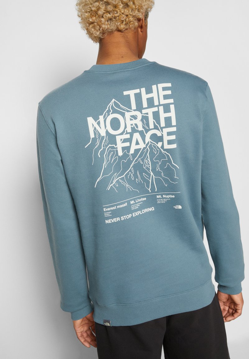 The North Face Mountain Outline Crew Goblin Sweatshirt Blue White Blue Zalando Co Uk