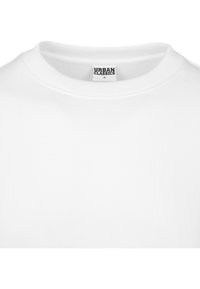 Witte sweatshirt met ronde hals gemaakt van zachte stof, met een ribbelkraag en een 'Urban Classics' label aan de binnenkant van de halslijn. Eenvoudig ontwerp.