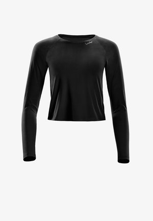 Chemise noire à manches longues et cropped avec un col rond et une texture douce. Présente des manches raglan et un petit logo en haut à gauche.