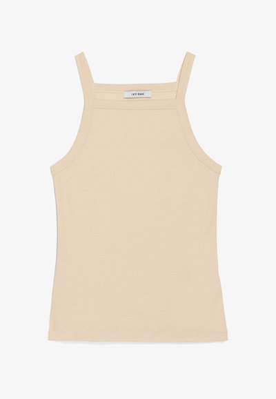 Top tank color beige chiaro realizzato in un tessuto morbido ed elasticizzato. Presenta spalline sottili e un design semplice, aderente, senza motivi o abbellimenti.