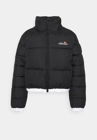 Cropped black puffer jacket with high collar, horizontal stitching, front zipper, and white elastic hem and cuffs. Features logo on chest.