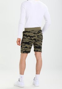Diesel Teplákové kalhoty - olive