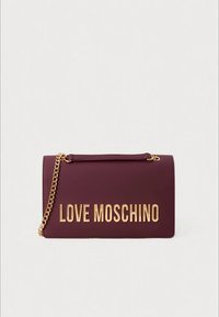 Burgundy rectangular handbag with gold chain strap and large gold "LOVE MOSCHINO" lettering on the front.