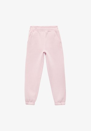 Lichtroze trainingsbroek gemaakt van zachte stof, met een trekkoord in de taille, twee zijzakken en elastische boorden bij de enkels.