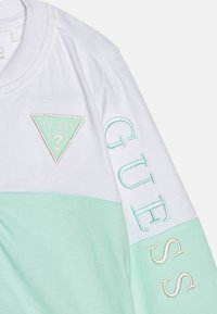 Guess BABY BODY PANTS UNISEX SET - Gornji dio trenirke - aqua breeze