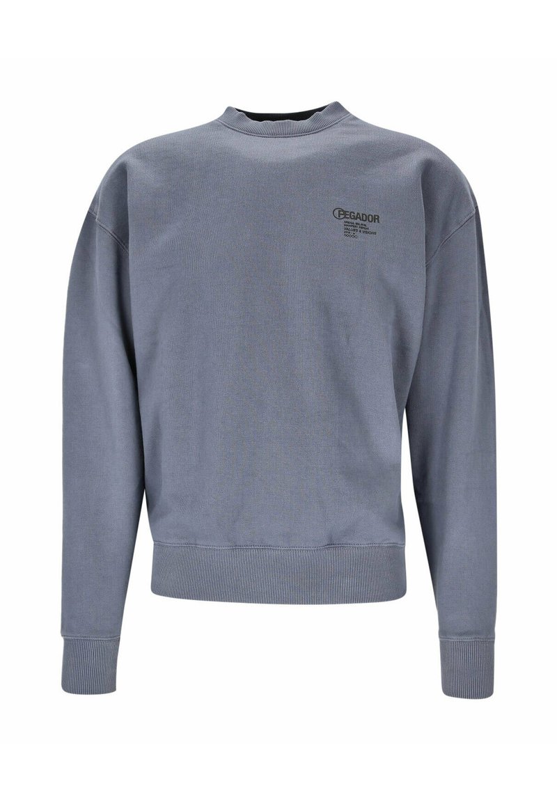 Grå bomullströja med ribbad rundhals, långa ärmar och en liten svart logga på bröstet. Mjuk textur med en avslappnad passform.