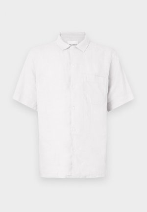 Short-sleeved, collared white shirt made of linen, featuring a button front and a single chest pocket. Smooth texture and classic design.