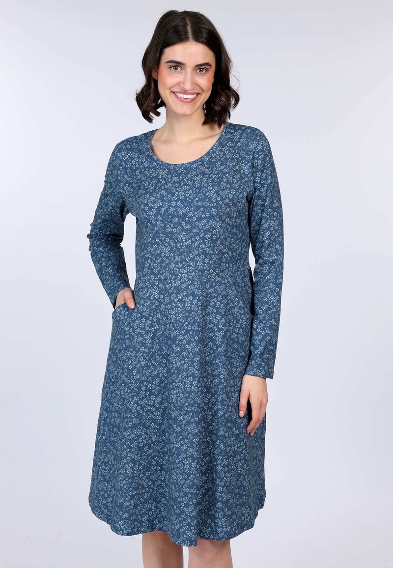 Langärmliges, knielanges Kleid aus dunkelblauem Stoff mit floralem Muster. Verfügt über Taschen und einen runden Ausschnitt. Weiches, strukturiertes Material.