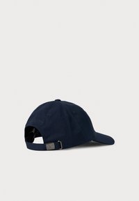 Navy blue baseball cap shown from back with adjustable strap and metal buckle on plain white background.